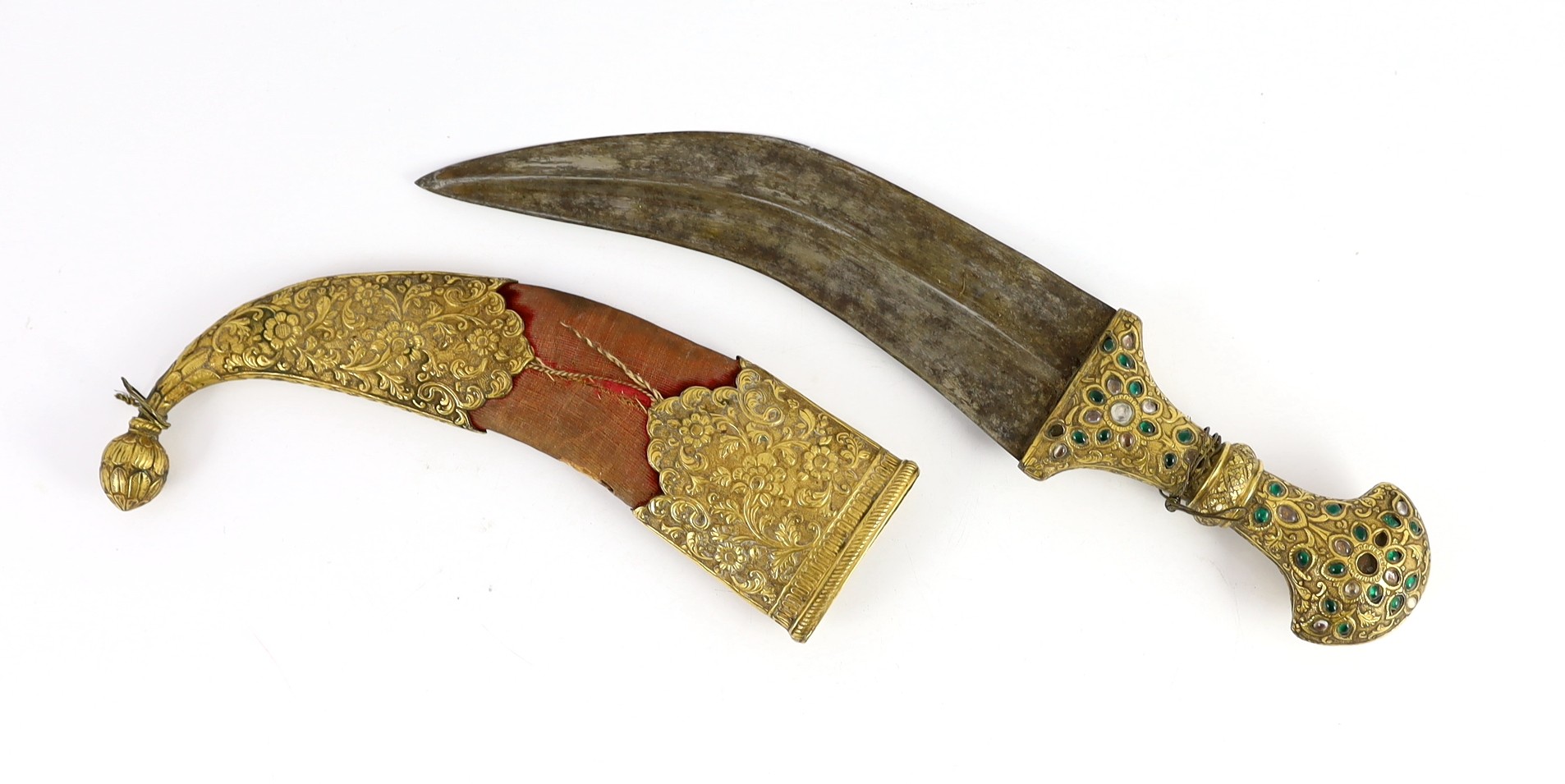 An Indian gilt copper and paste mounted dagger (jambiya), Kutch, 19th century, dagger 33cm long, scabbard 22cm long